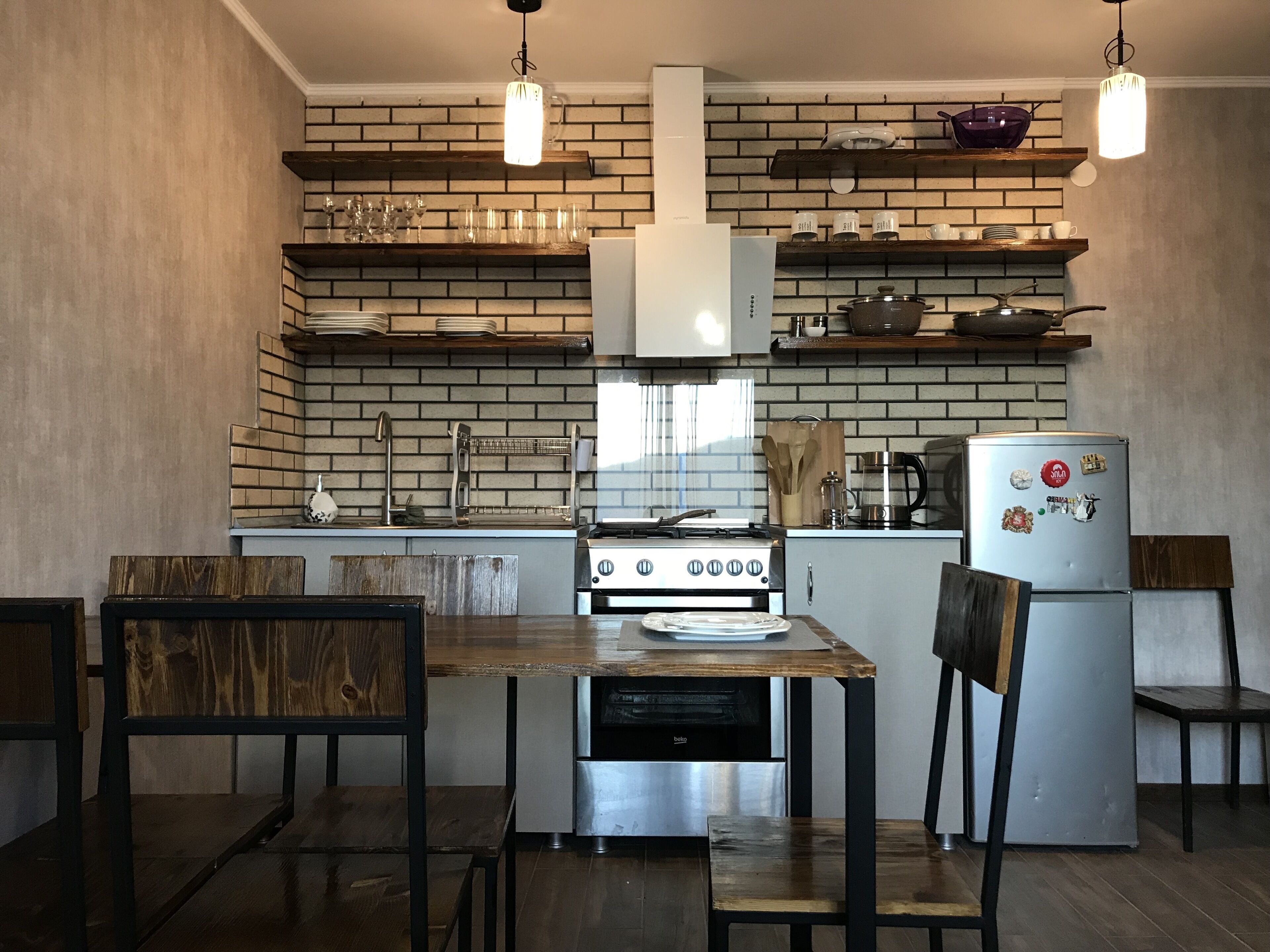 Fridge, toaster, cookware/dishes/utensils, paper towels