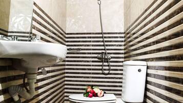 Shower, rainfall showerhead, towels