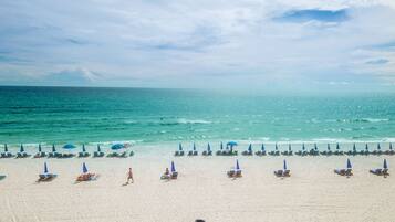 On the beach, sun loungers