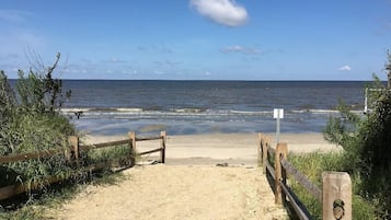 On the beach, sun loungers, beach towels