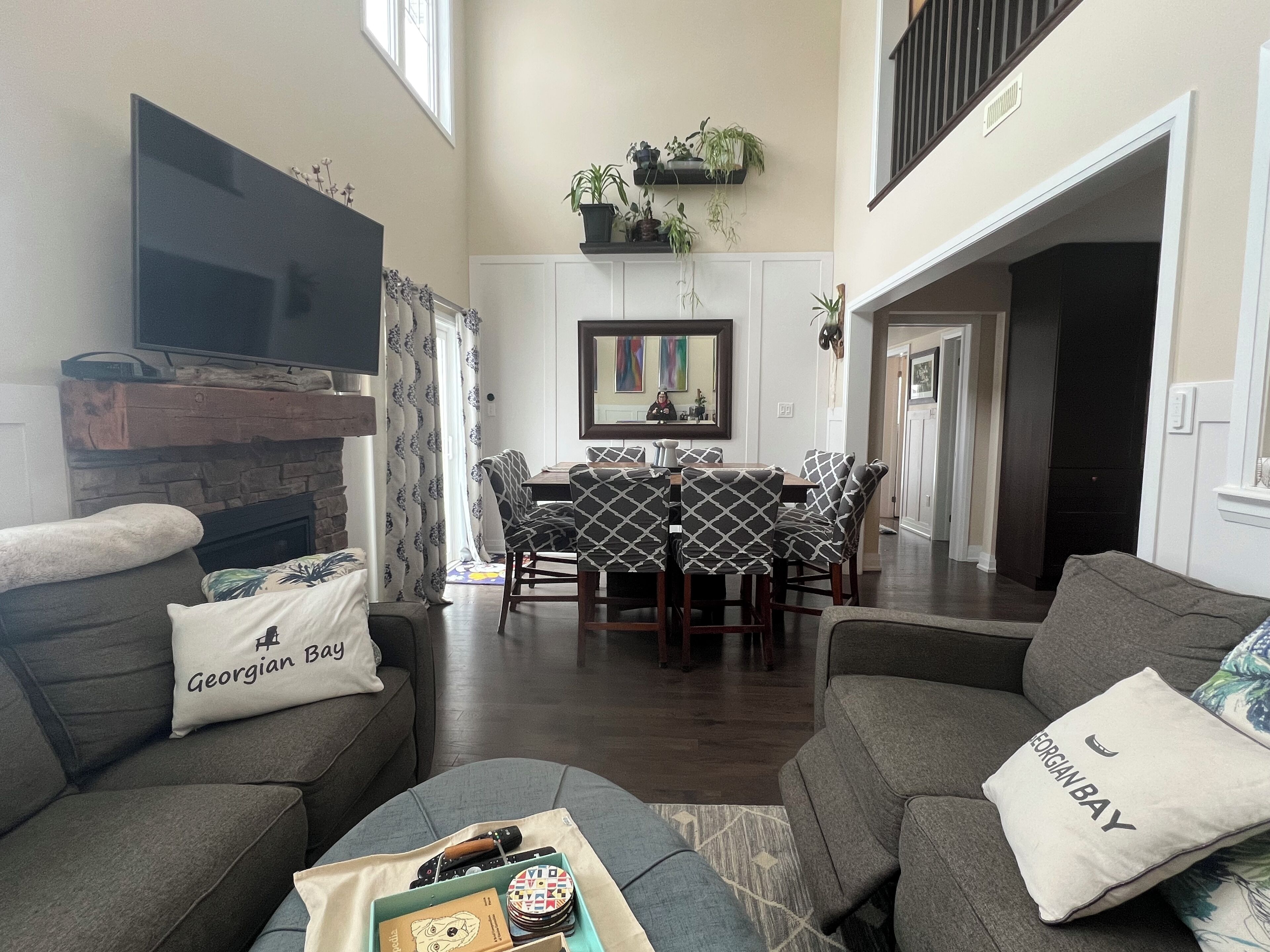 Smart TV, fireplace, books, printers