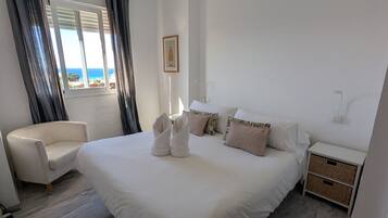 2 dormitorios, tabla de planchar con plancha, wifi gratis y ropa de cama