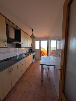 Fridge, microwave, coffee/tea maker, toaster