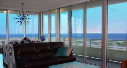 Floor To Ceiling Windows Overlook The Gulf of America's Pristine White Beaches