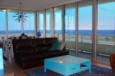 Floor To Ceiling Windows Overlook The Gulf of America's Pristine White Beaches
