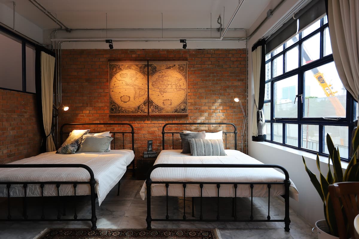 Deluxe Twin kamer | Individueel gedecoreerd, individueel gemeubileerd, een bureau