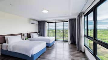 Junior Suite, 2 Single Beds, Non Smoking (Larger Room) | Free minibar, in-room safe, individually decorated, desk