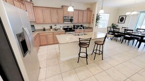 Family Villa, Garden Area | Shared kitchen facilities