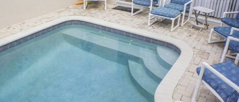 Seasonal outdoor pool, pool umbrellas, pool loungers