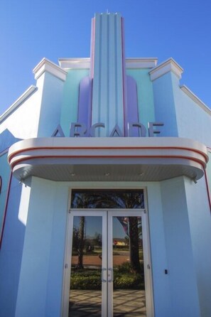 A building with a sign that reads "ARCADE" above the entrance. - Aco248528 - Festival Resort - 5 Bed 5.5 Baths Townhome (Davenport)