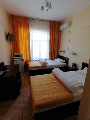 Economy Twin Room | Iron/ironing board, cribs/infant beds, free WiFi, bed sheets - Hotel Shugla (Almaty)