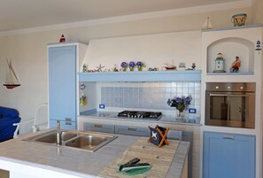 Penthouse Panoramique, plusieurs lits, vue mer | Cuisine privée | Grand réfrigérateur, four, plaque de cuisson
