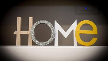 A display of the word "HOME" with different font styles and colors.