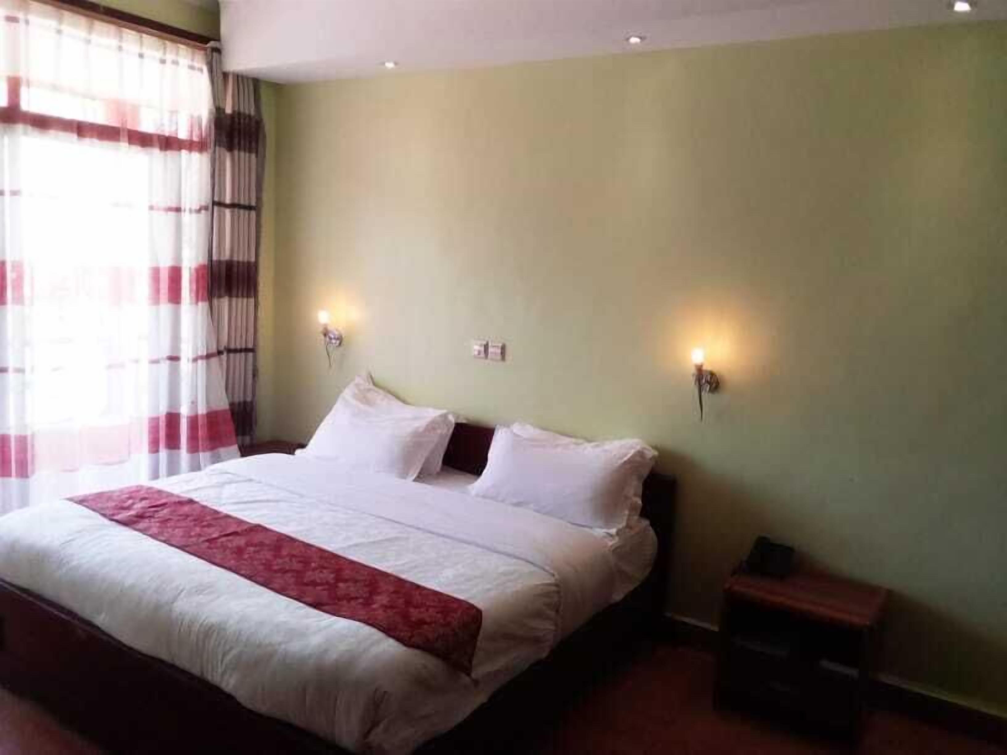 executive double room, 1 king bed, non smoking | desk, free cots/infant beds, free wifi, bed sheets