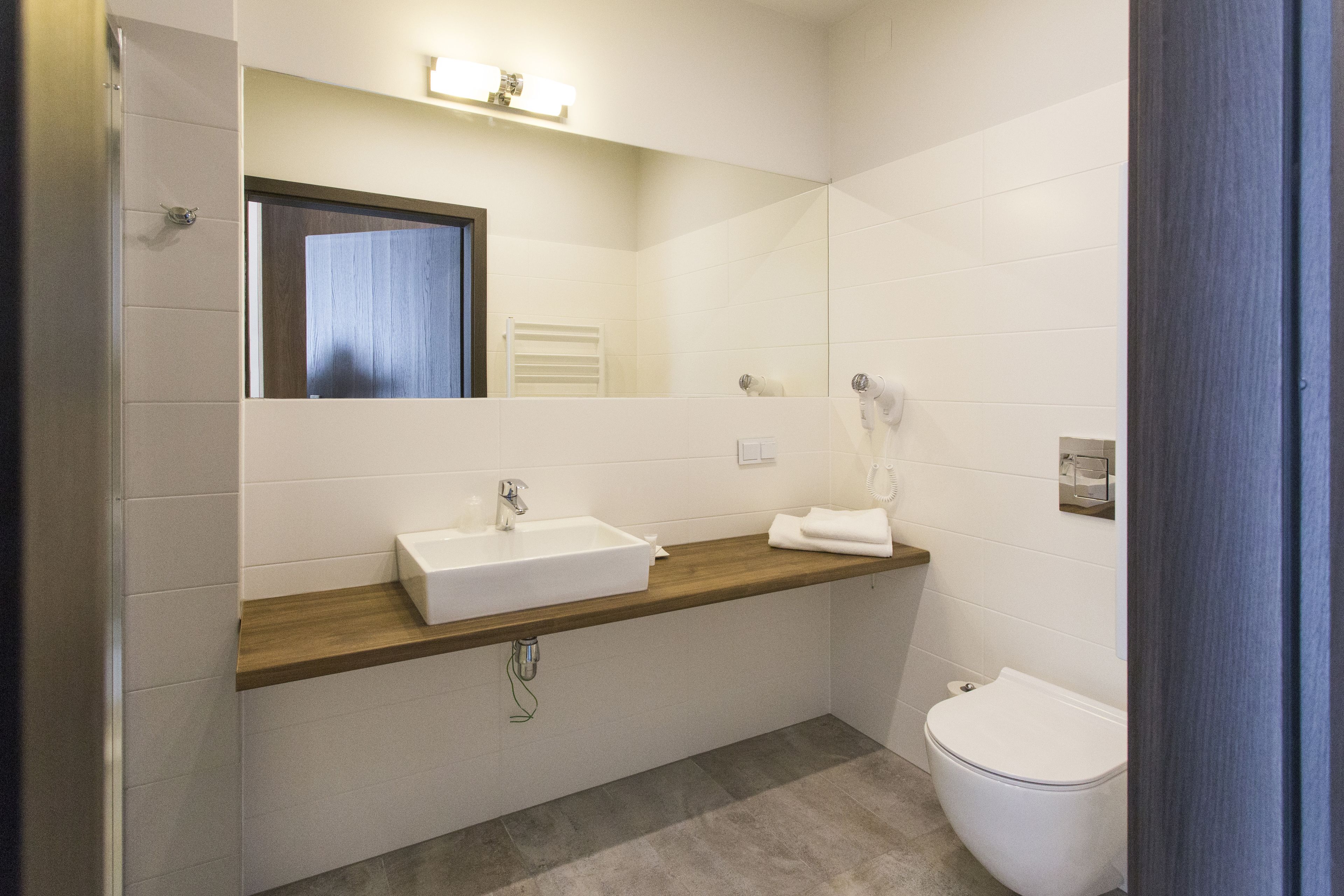family room | bathroom | shower, free toiletries, hair dryer, towels