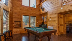 A wooden cabin with a pool table, a mounted deer head, and a cozy seating area. - The Game Changer! Next to Dollywood/Hot-Tub/Pool/LUXURY (Pigeon Forge)