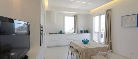 Appartement, Meerdere bedden, niet-roken | Dineren op de kamer