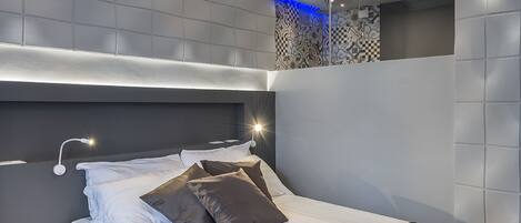 Literie de qualité supérieure, coffres-forts dans les chambres