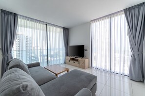 Deluxe Condo, 2 Bedrooms, Sea View | Living area - The Point Pratumnak by PSR ASIA (Pattaya)