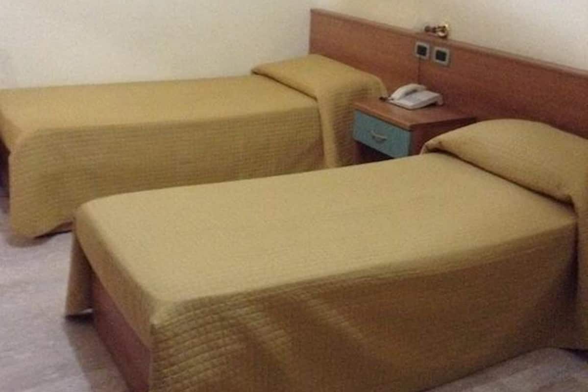 Triple Room, Multiple Beds, Non Smoking | In-room safe, desk, free cots/infant beds, free WiFi
