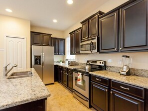 Family Villa, Private Pool, Garden Area | Shared kitchen | Fridge, microwave, oven