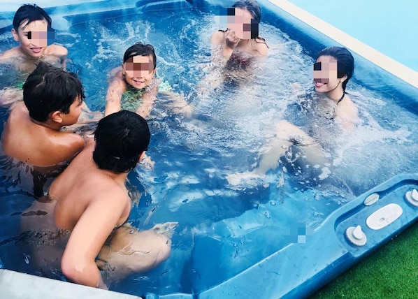 Seasonal outdoor pool, pool loungers