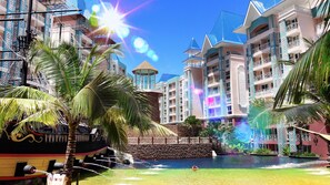 Outdoor pool, open 7:00 AM to 8:00 PM, pool loungers