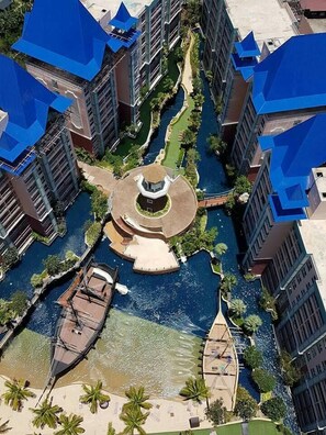 Outdoor pool, open 7:00 AM to 8:00 PM, pool loungers