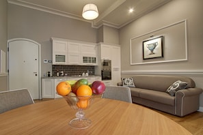 Apartment, 1 Bedroom | Living area | 32-inch flat-screen TV with cable channels, TV