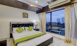 Standard Room | Desk, iron/ironing board, free WiFi, bed sheets - Treebo Soho Newtown Near New Town Bus Stand (Barasat)