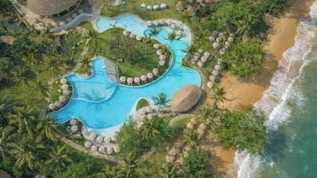 4 outdoor pools, open 8 AM to 8 PM, free cabanas, pool umbrellas