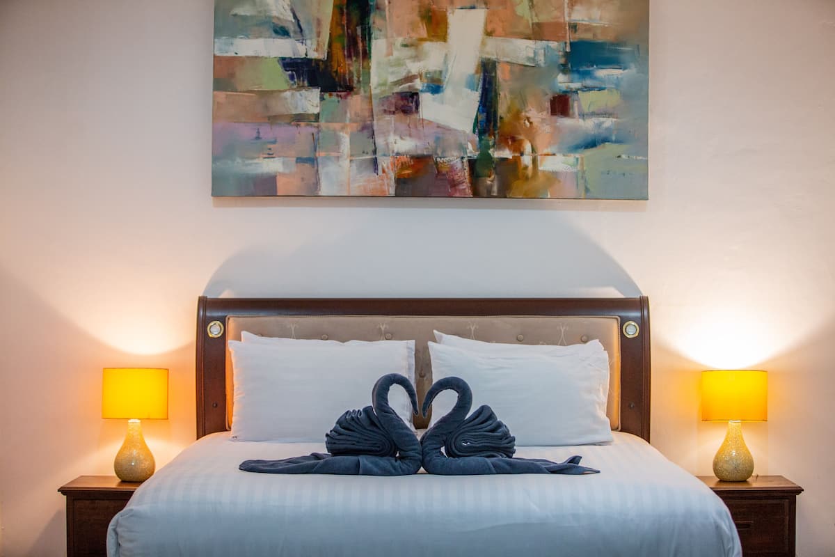 Family Room, 2 Bedrooms, Accessible, Garden View | Minibar, in-room safe, blackout curtains, soundproofing