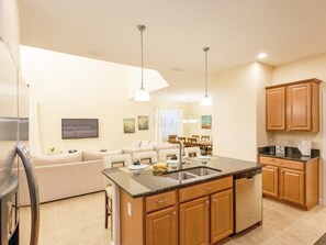 Family Villa, Hot Tub, Garden Area | Shared kitchen | Fridge, microwave, oven