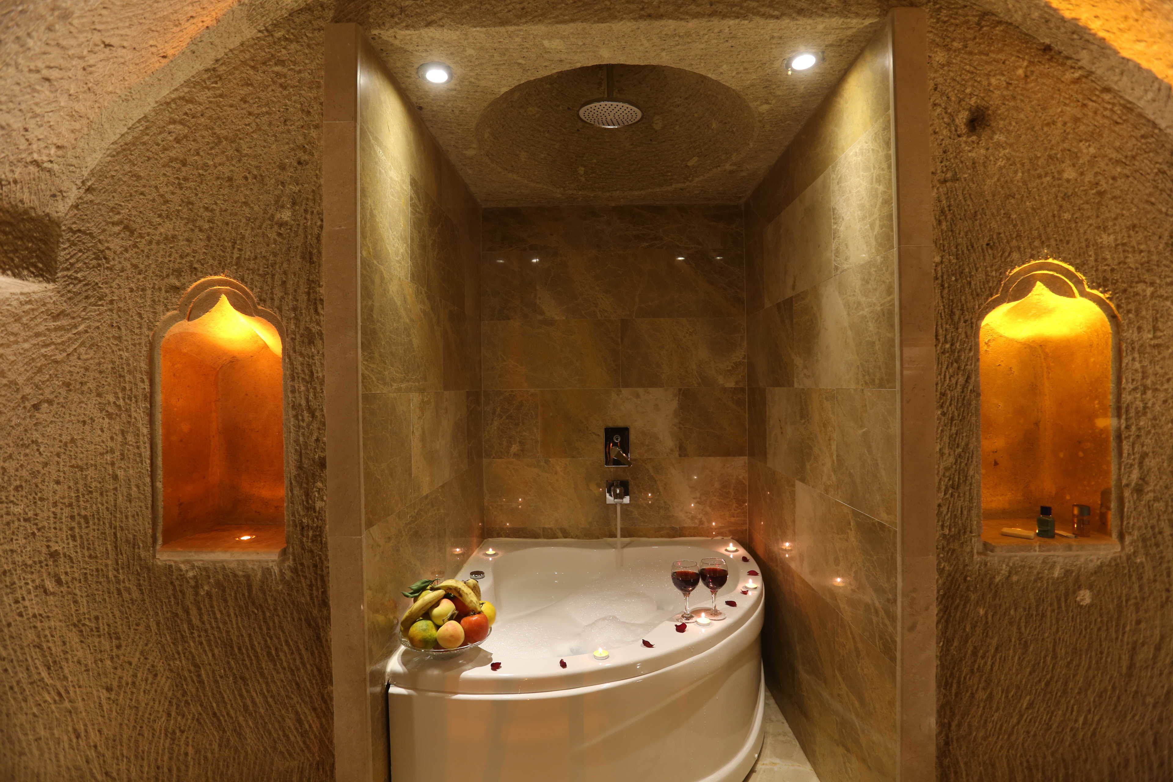 deluxe room | bathroom | separate bathtub and shower, jetted bath, hydromassage showerhead