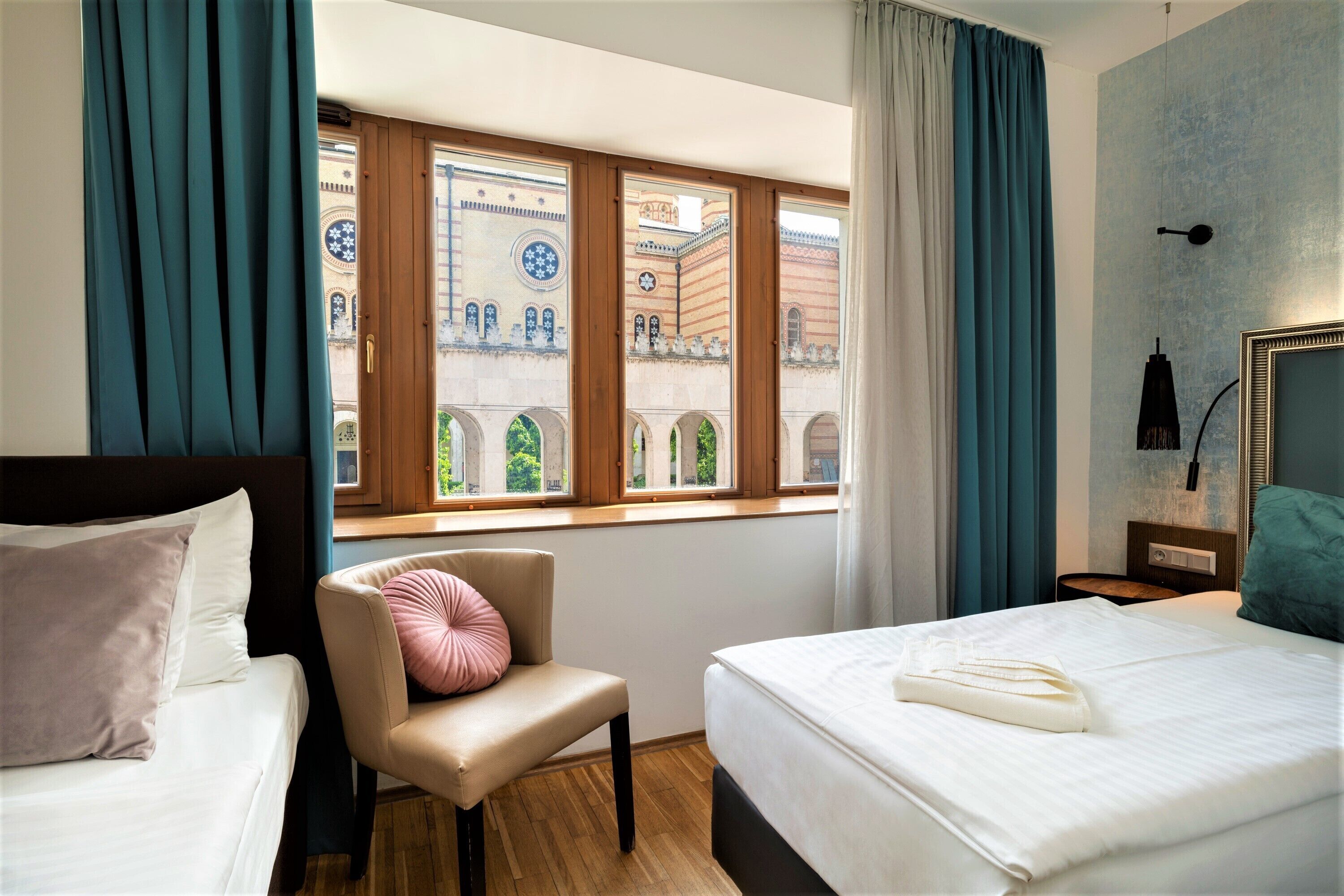 deluxe triple room | 1 bedroom, minibar, in-room safe, blackout curtains