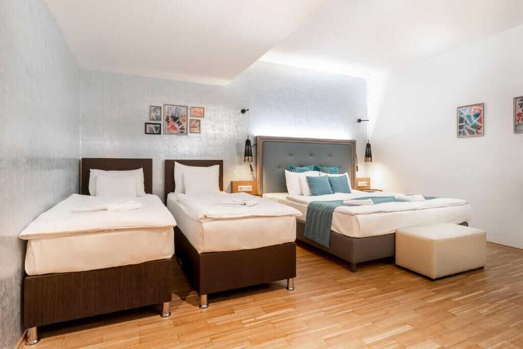 deluxe quadruple room | 1 bedroom, minibar, in-room safe, blackout curtains