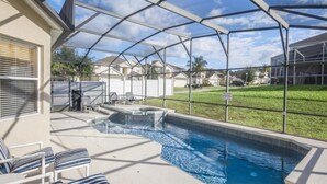 A covered outdoor swimming pool with lounge chairs and a hot tub. - Ip60299 - Highlands Reserve - 5 Bed 2.5 Baths Villa (Davenport)