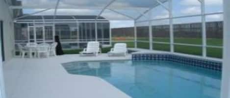 Seasonal outdoor pool, pool loungers