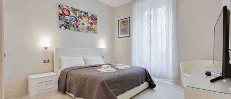 Apartment, 2 Bedrooms | 2 bedrooms, in-room safe, desk, iron/ironing board