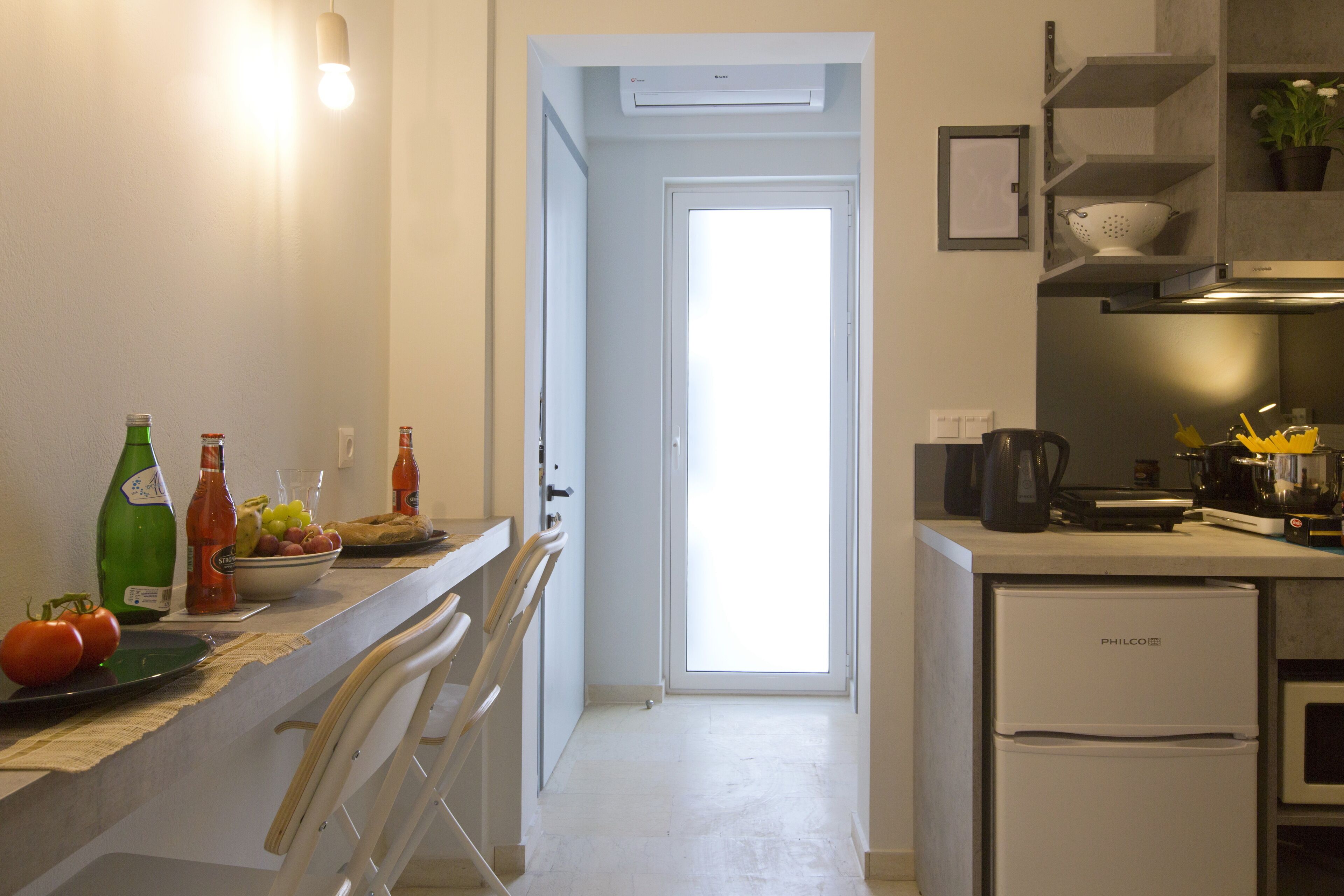 city suite, 1 bedroom, kitchenette, city view | private kitchen | fridge, microwave, coffee/tea maker, electric kettle