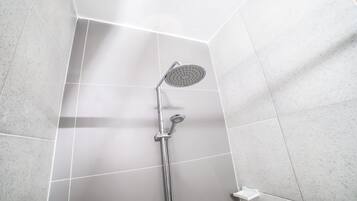 Family Apartment, 3 Bedrooms, Non Smoking | Bathroom | Deep-soaking bathtub, towels