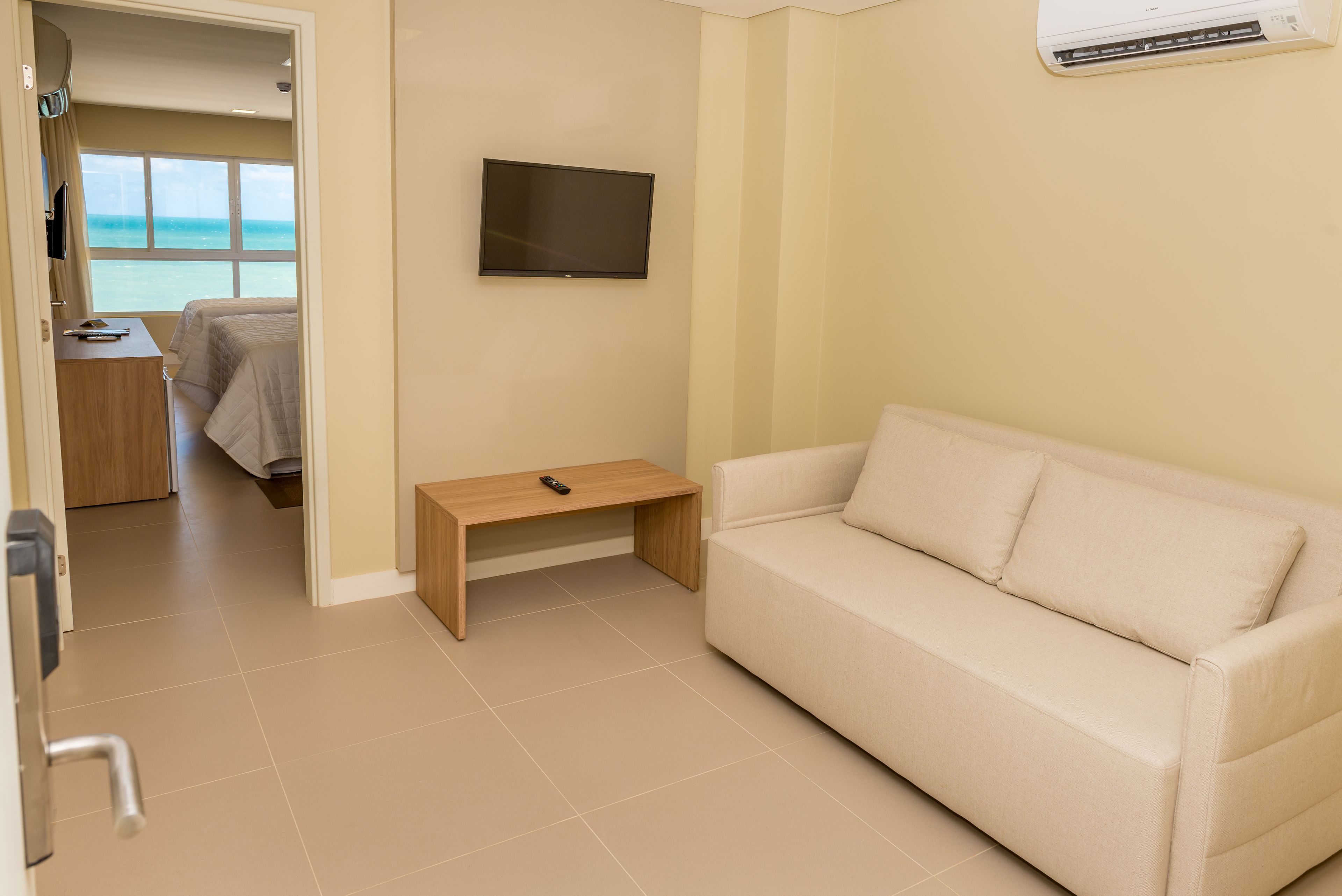 deluxe room | living area | 32-inch smart tv with cable channels, tv