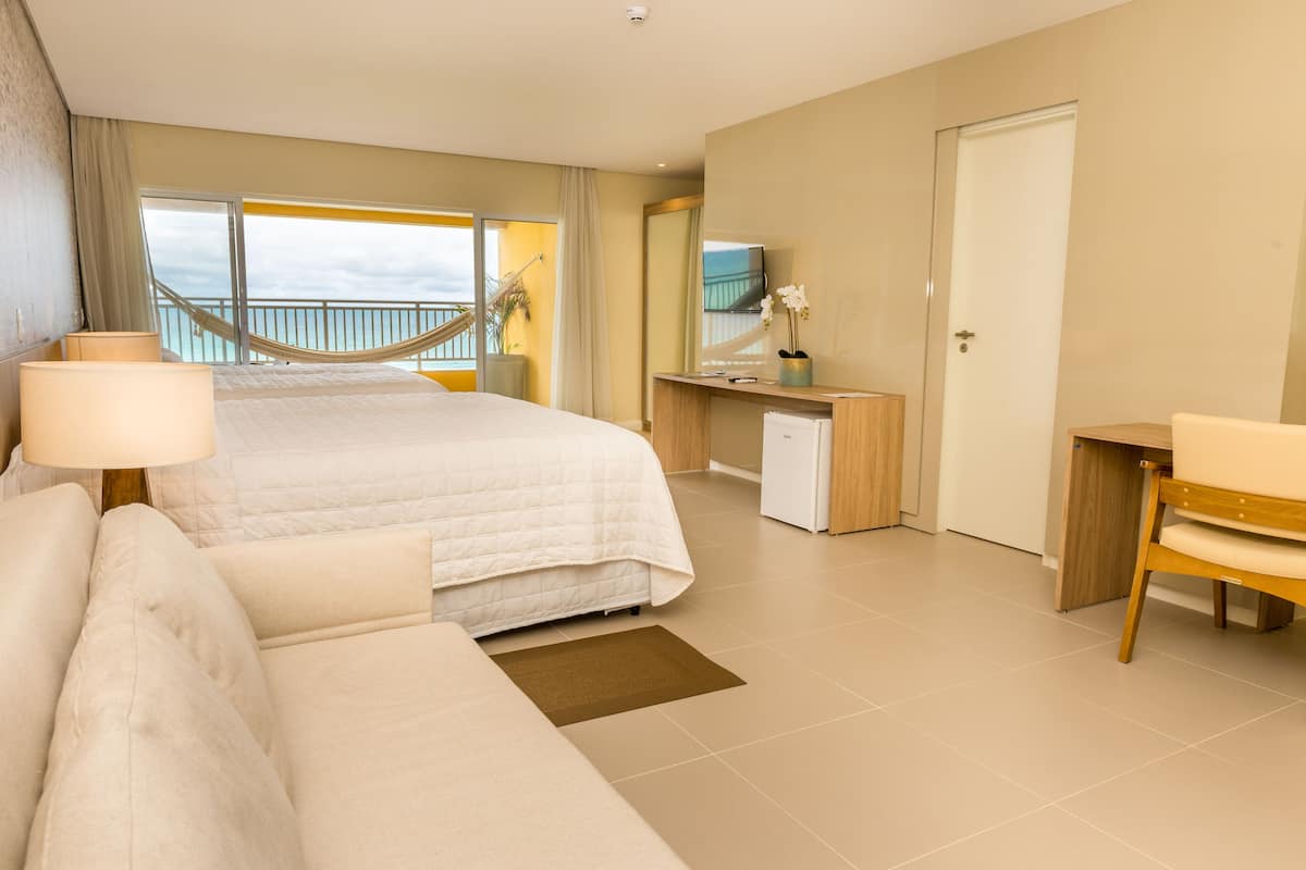 family room, sea facing | 1 bedroom, premium bedding, minibar, in-room safe