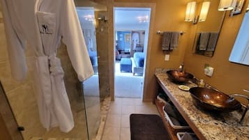 Shower, hair dryer, bathrobes, towels