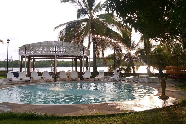 Outdoor pool, open 8 AM to 9 PM, pool umbrellas, sun loungers