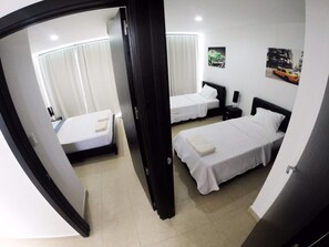 2 habitaciones y ropa de cama