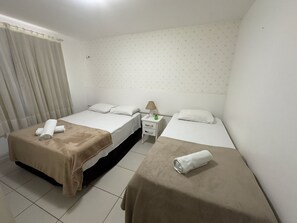 Standard Apartment, 3 Bedrooms, Pool View, Ground Floor | 3 bedrooms, blackout drapes, iron/ironing board, free WiFi