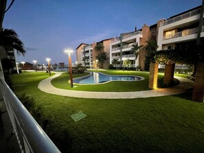 Standard Apartment, 3 Bedrooms, Pool View, Ground Floor | Pool | 2 outdoor pools, open 7:00 AM to 8:00 PM, free cabanas, pool umbrellas