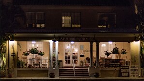 Front of property – evening/night - Seminole Inn (Indiantown)