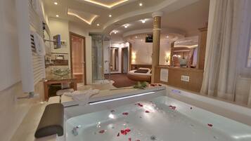Luxury Suite, Hot Tub (Spa Suite) | Minibar, in-room safe, individually decorated, individually furnished